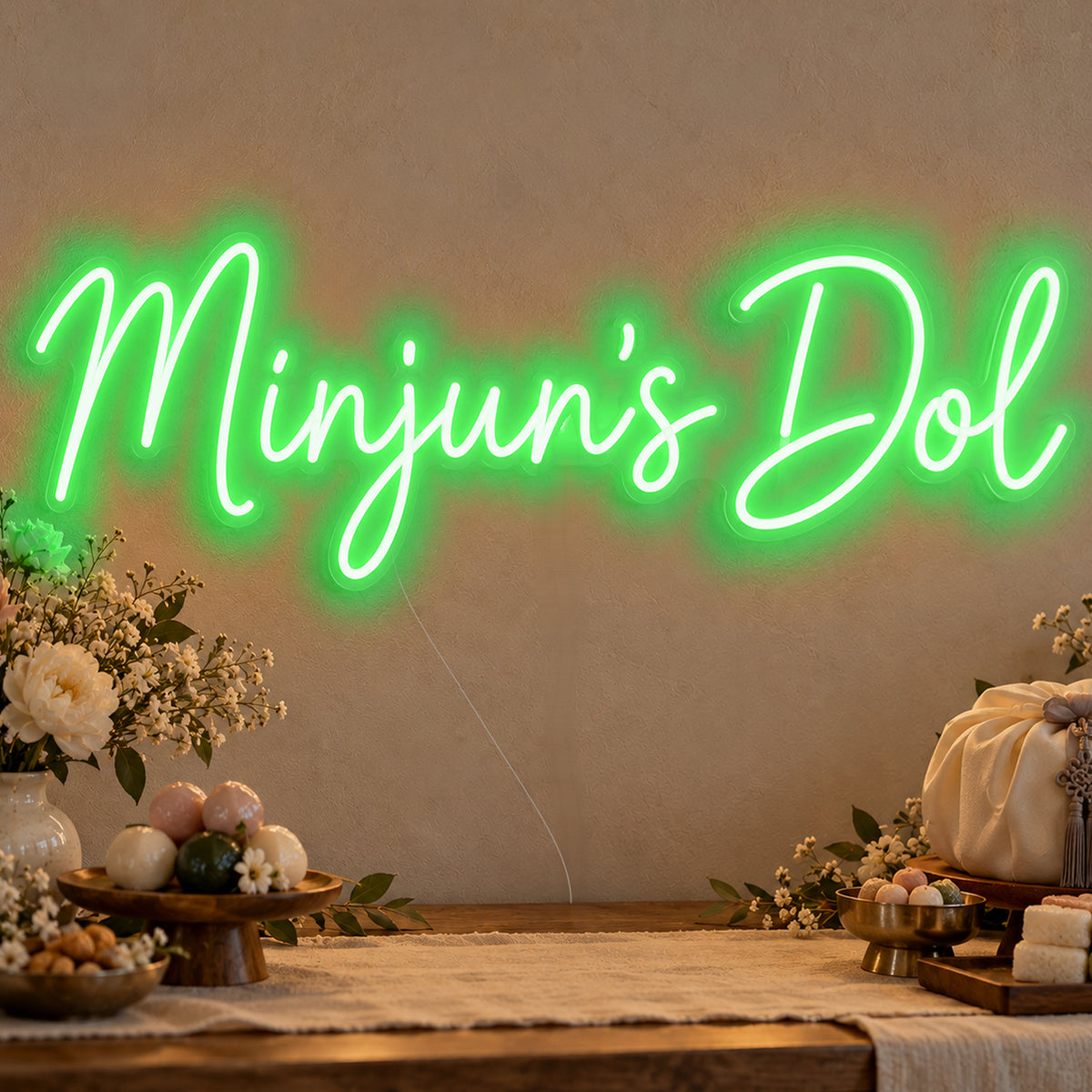Personalised Dol Neon Sign in green LED neon on clear acrylic, angled view