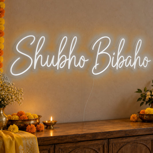 Shubho Bibaho Neon Sign in white LED neon on clear acrylic, angled view