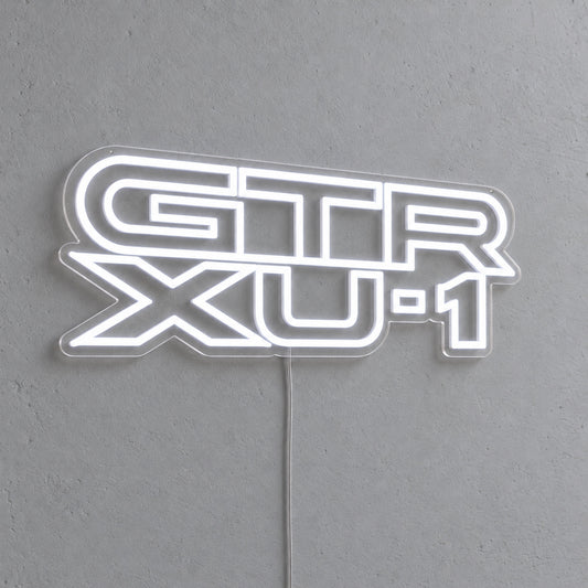 Holden Torana GTR-XU1 LED Neon Sign in white, featuring stacked GTR XU-1 lettering on a grey wall.