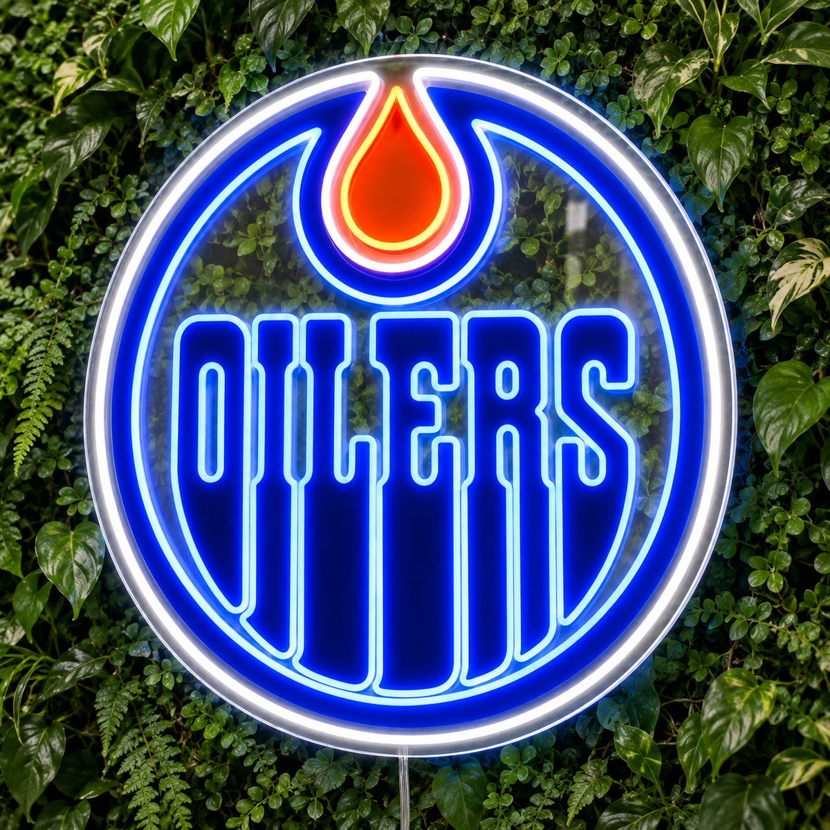 Edmonton Oilers LED Neon Sign, featuring team logo displayed on a green foliage wall.