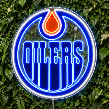 Edmonton Oilers LED Neon Sign, featuring team logo displayed on a green foliage wall.