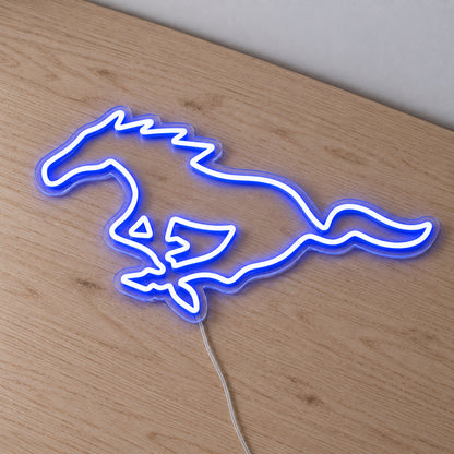 Ford Mustang Horse LED Neon Sign in blue, featuring a galloping Mustang horse outline on a wooden surface.
