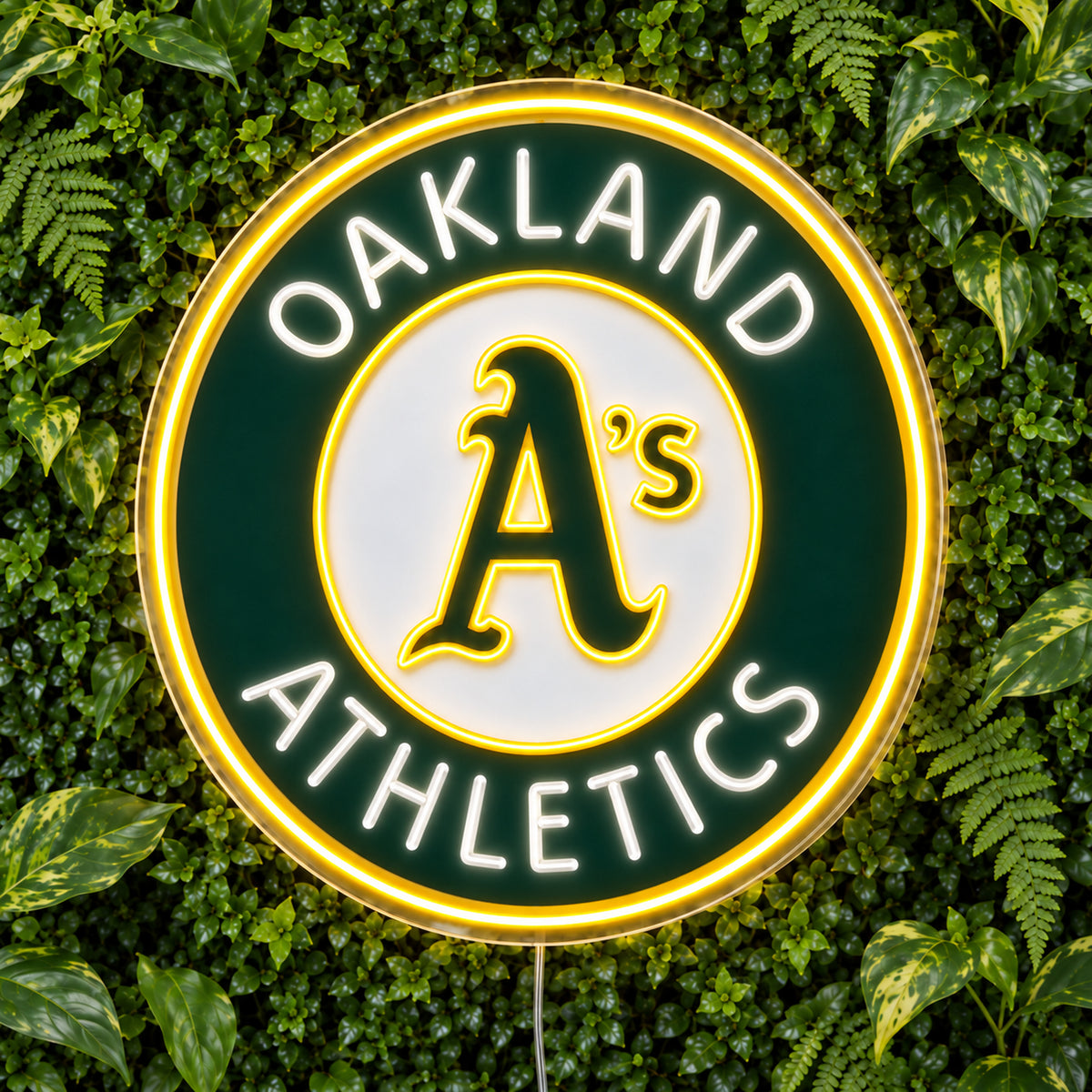 Oakland Athletics LED Neon Sign, featuring illuminated team logo on a green foliage wall.
