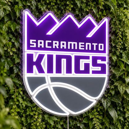 Sacramento Kings LED Neon Sign, featuring team logo displayed on a green foliage wall.