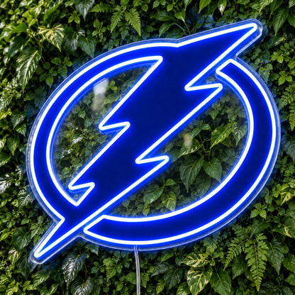 Tampa Bay Lightning LED Neon Sign, featuring team logo displayed on a green foliage wall.