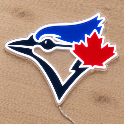 Toronto Blue Jays LED Neon Sign, featuring team logo displayed on a wooden surface.
