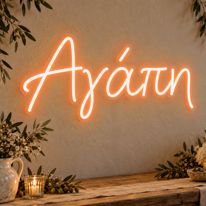 Agapi Greek Love Neon Sign in orange LED neon on clear acrylic, angled view
