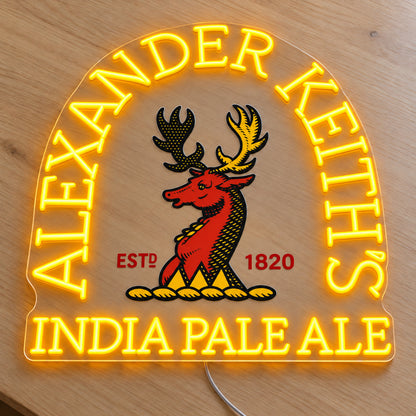 Alexander Keith’s LED neon sign on a light wooden surface, front view