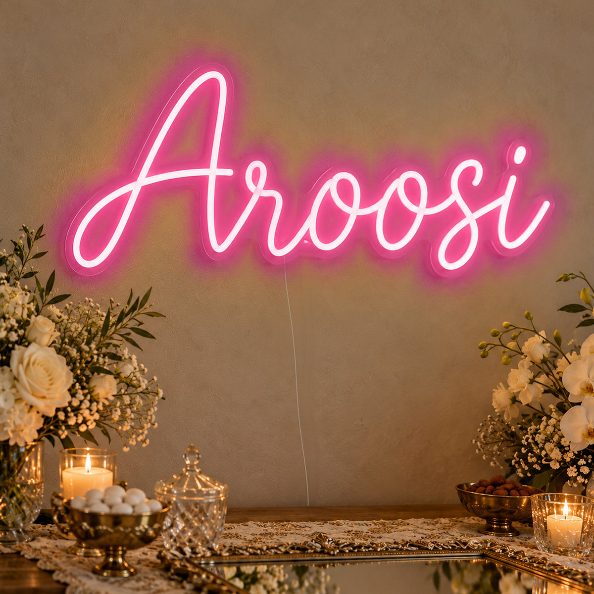 Aroosi Neon Sign in rose red LED neon on clear acrylic, angled view