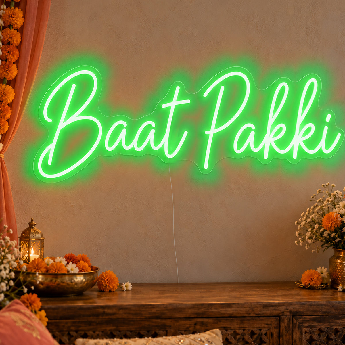 Baat Pakki Neon Sign in green LED neon on clear acrylic, angled view