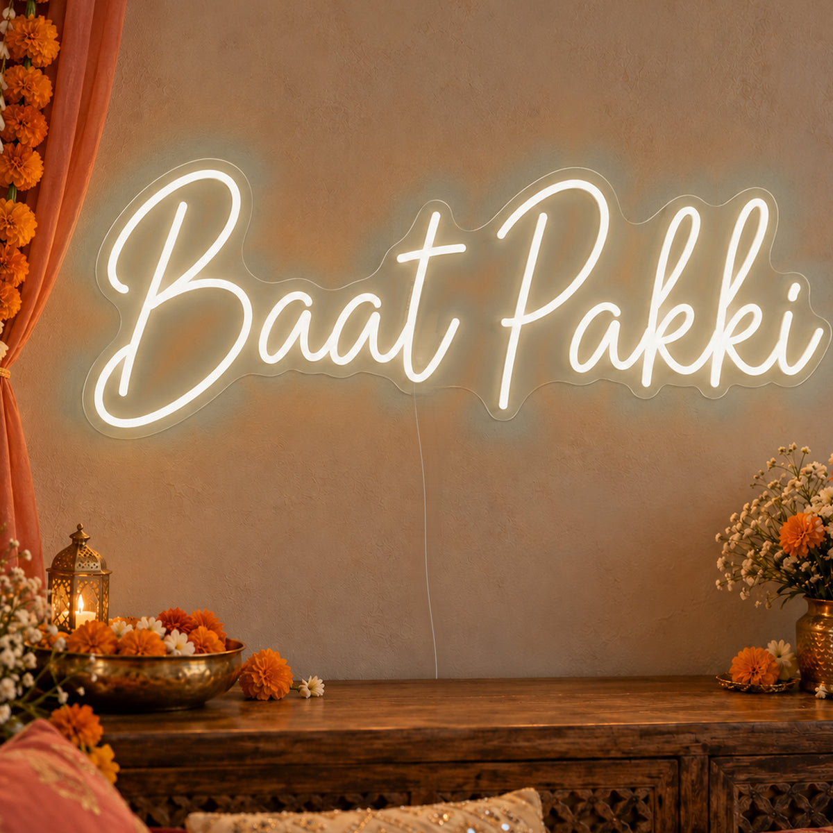 Baat Pakki Neon Sign in warm white LED neon on clear acrylic, angled view