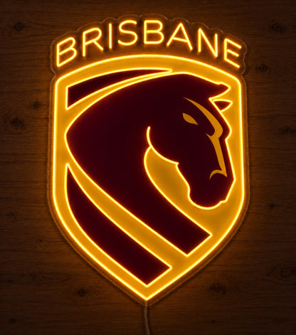 Brisbane Broncos Neon Sign glowing in dimmed lighting