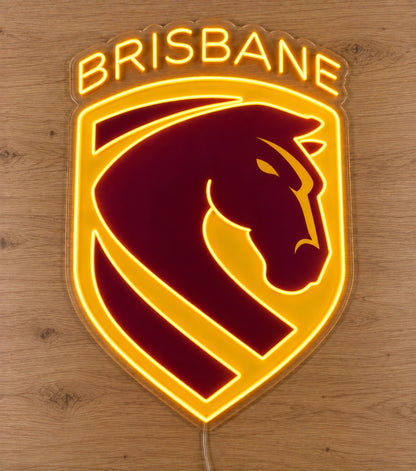 Brisbane Broncos Neon Sign on light wooden surface