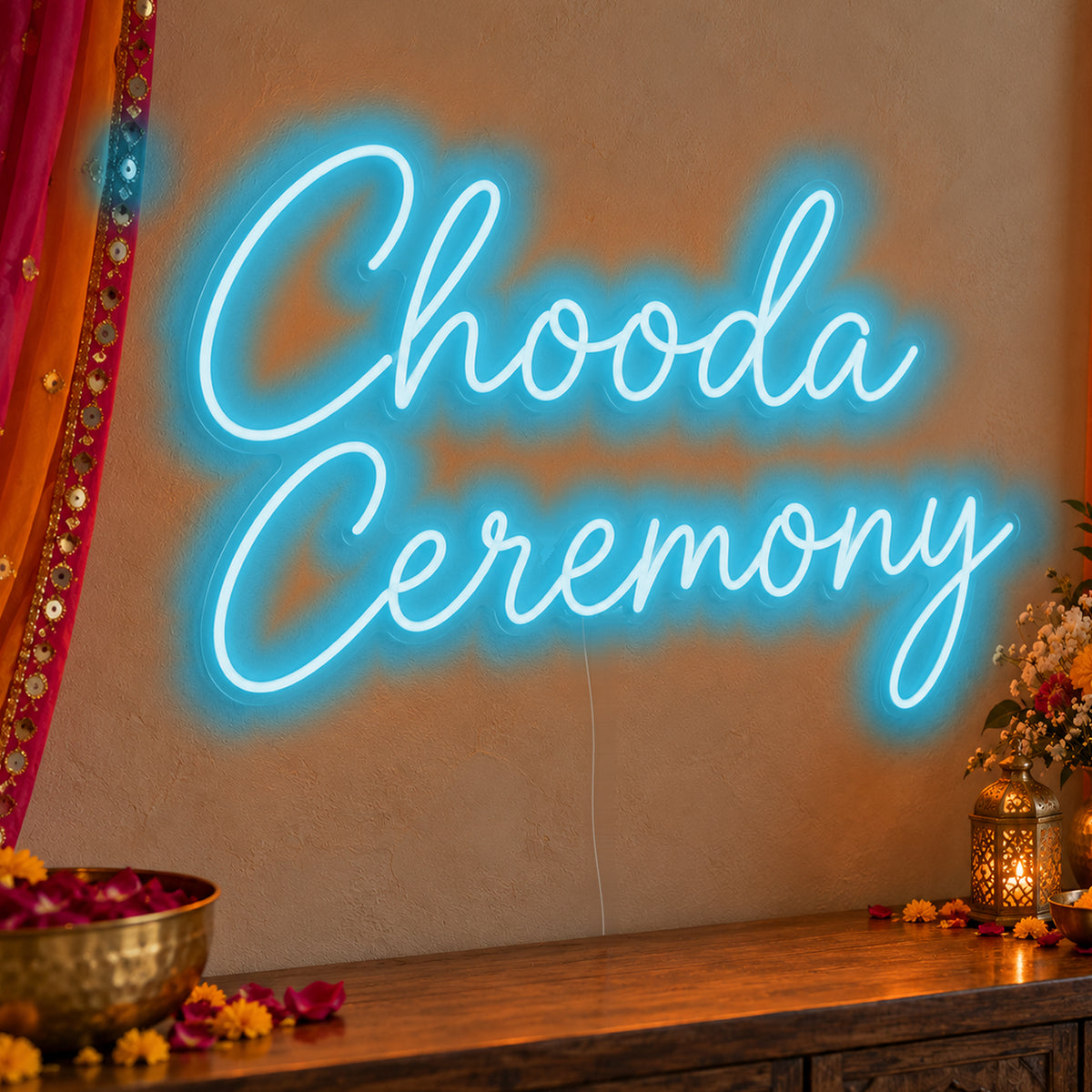 Chooda Ceremony Neon Sign in ice blue LED neon on clear acrylic, angled view