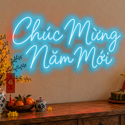 Chúc Mừng Năm Mới Neon Sign in ice blue LED neon on clear acrylic, angled view