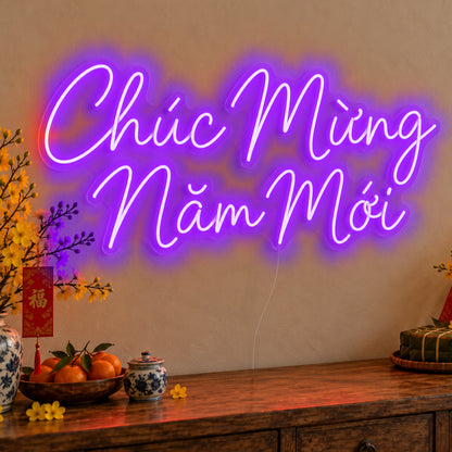 Chúc Mừng Năm Mới Neon Sign in purple LED neon on clear acrylic, angled view