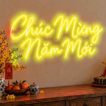 Chúc Mừng Năm Mới Neon Sign in yellow LED neon on clear acrylic, angled view
