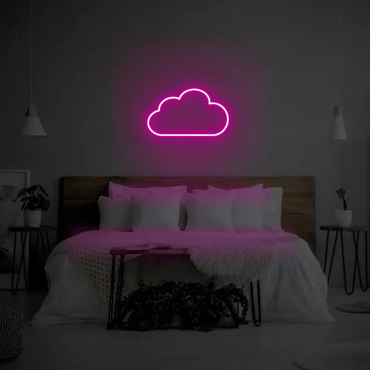 Cloud LED Neon Light Sign in pink, featuring cloud outline illuminated above a bed.