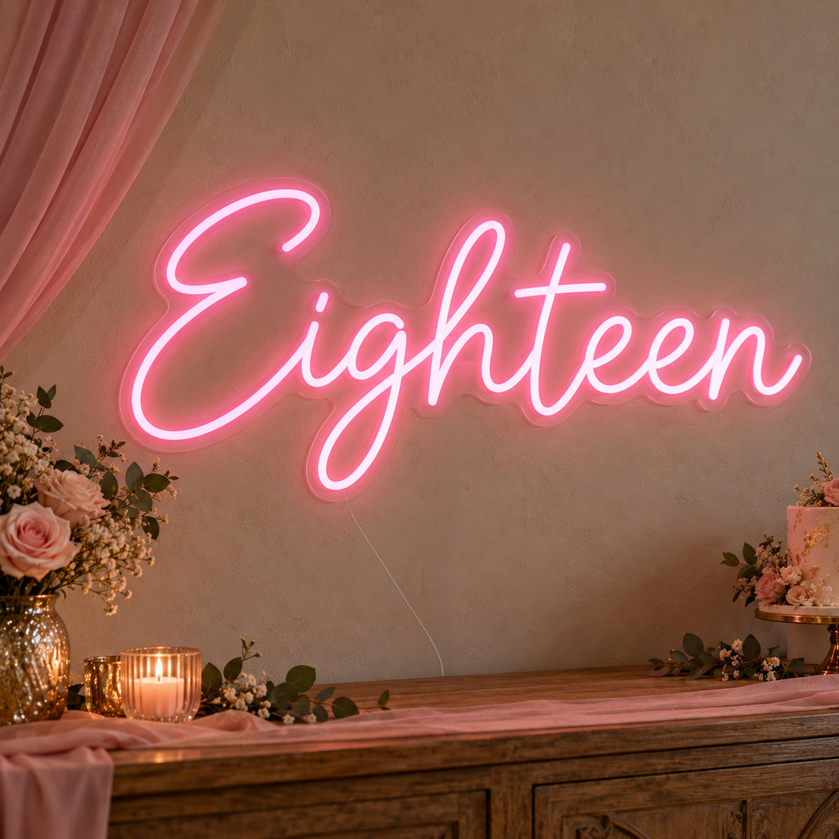 Eighteen Neon Sign on clear cut-to-shape acrylic, illuminated on a wall in a styled celebration setting