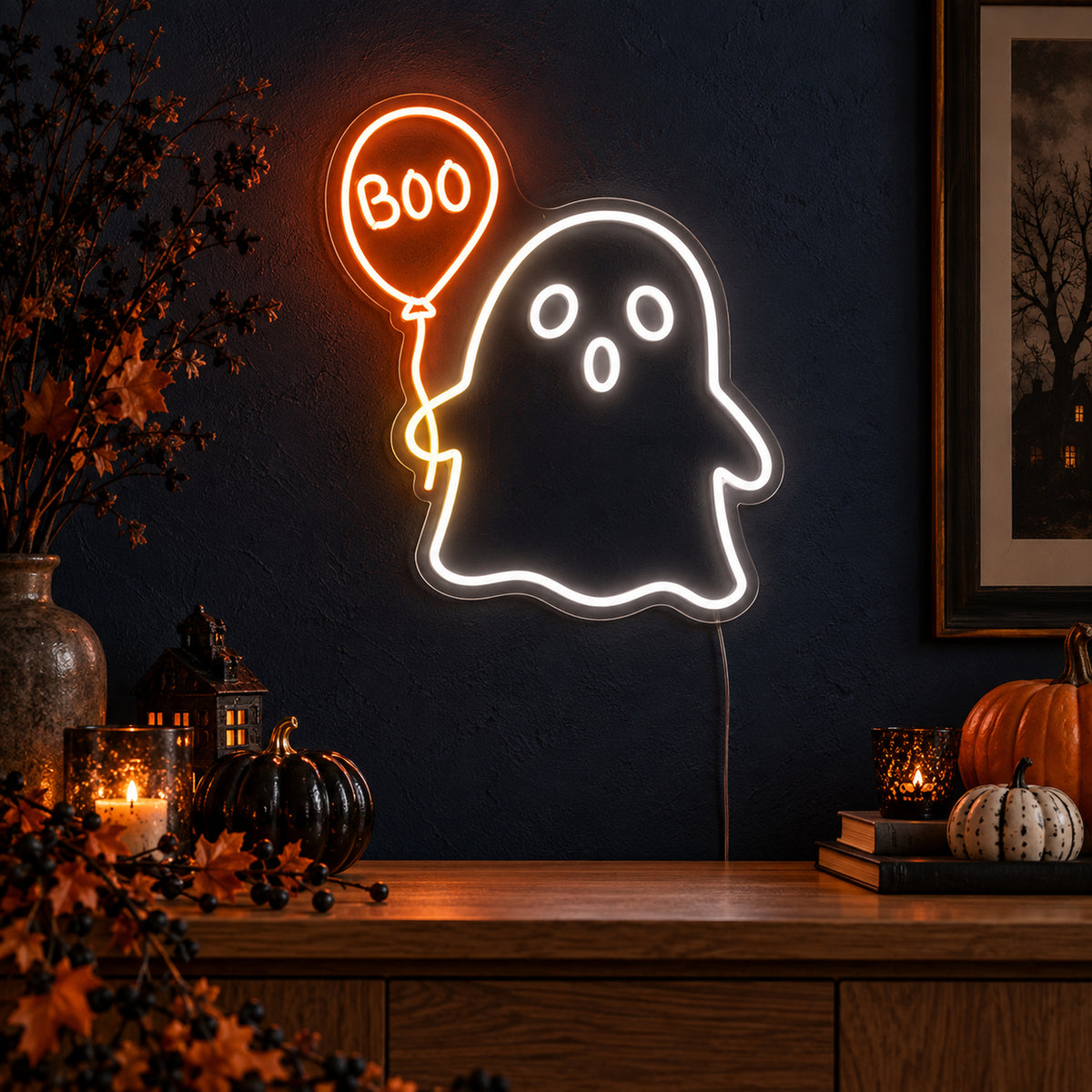 Ghost with Boo Balloon Neon Sign featuring a white ghost holding an orange balloon with Boo lettering, glowing on a dark wall in a Halloween room display.