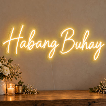 Habang Buhay Neon Sign in gold LED neon on clear acrylic, angled view