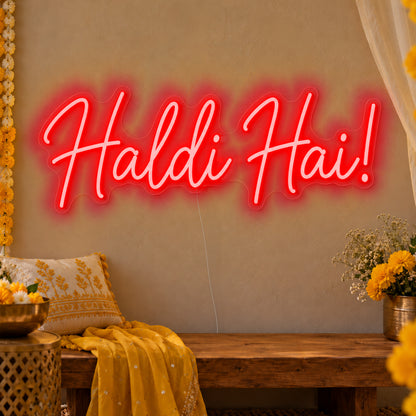 Haldi Hai Neon Sign in red LED neon on clear acrylic, angled view