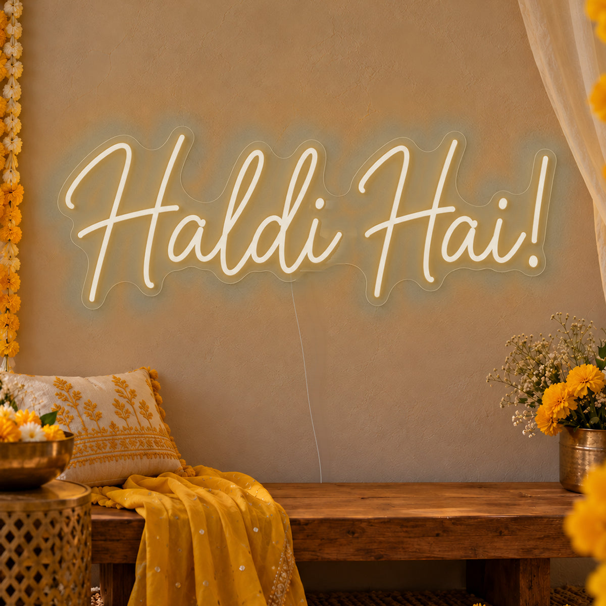 Haldi Hai Neon Sign in warm white LED neon on clear acrylic, angled view