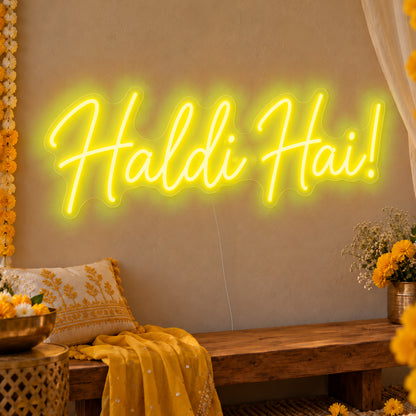 Haldi Hai Neon Sign in yellow LED neon on clear acrylic, angled view
