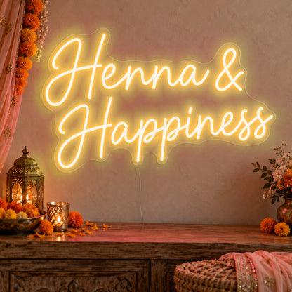 Henna Happiness Neon Sign in gold LED neon on clear acrylic, angled view