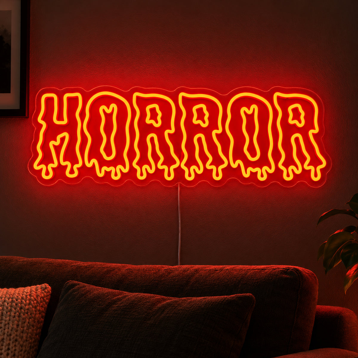 Horror Dripping Letters Neon Sign featuring the word Horror in orange outlined letters with dripping edges, glowing on a dark living room wall.