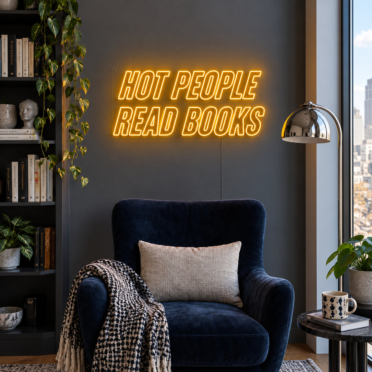 Hot People Read Books Neon Sign glowing gold above a blue reading chair.
