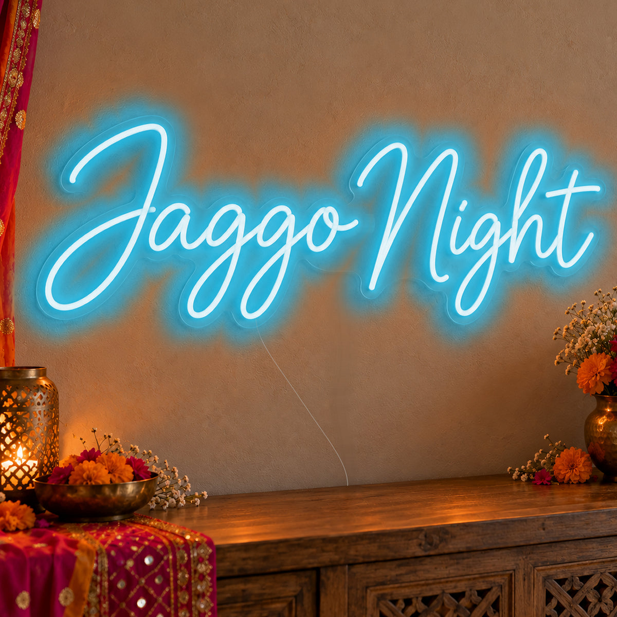 Jaggo Night Neon Sign in ice blue LED neon on clear acrylic, angled view