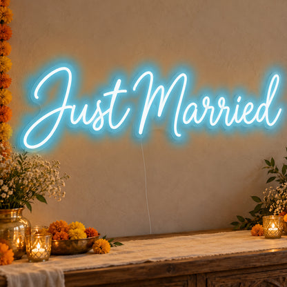 Just Married Neon Sign in ice blue LED neon on clear acrylic, angled view
