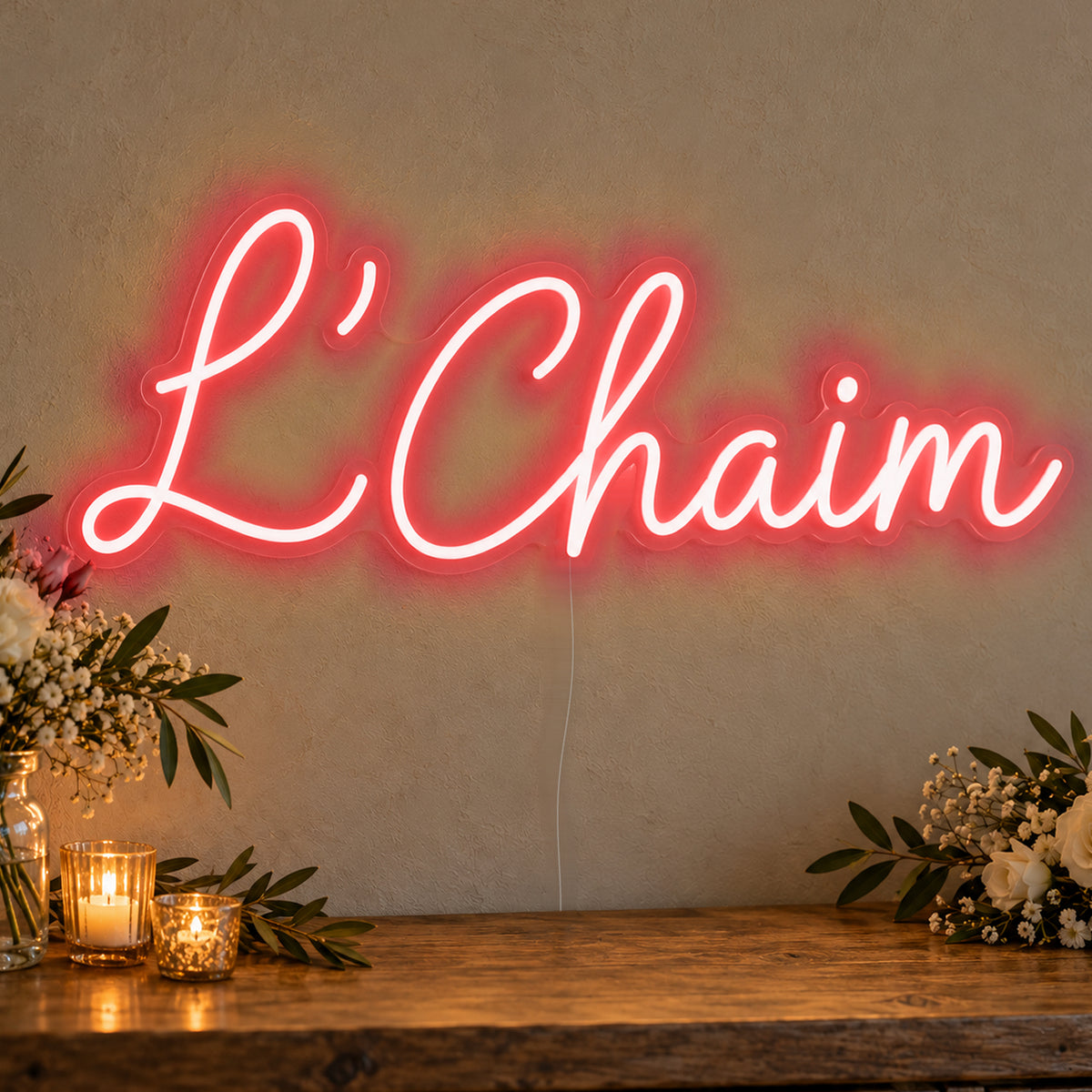 L’Chaim Neon Sign in red LED neon on clear acrylic, angled view