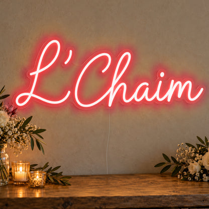 L’Chaim Neon Sign in red LED neon on clear acrylic, angled view
