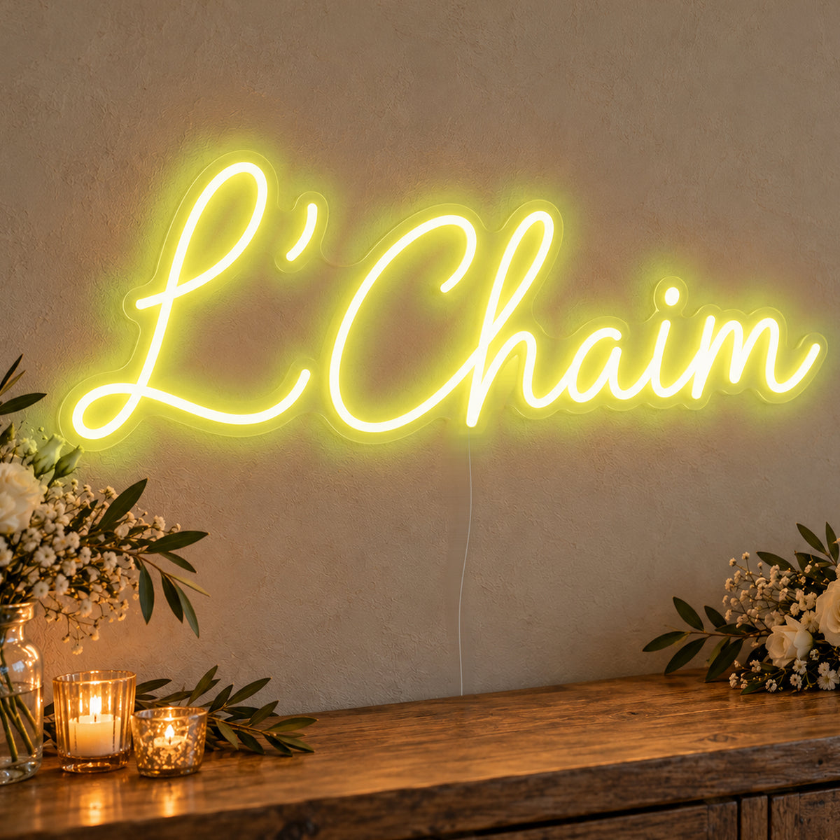 L’Chaim Neon Sign in yellow LED neon on clear acrylic, angled view