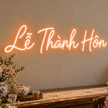 Lễ Thành Hôn Neon Sign in orange LED neon on clear acrylic, angled view