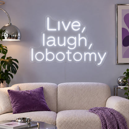 Live, Laugh, Lobotomy Neon Sign, RGB colour-changing option shown in white above a cream sofa with purple cushions.