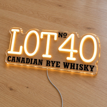 Lot No.40 LED neon sign on a light wooden surface, second angled view