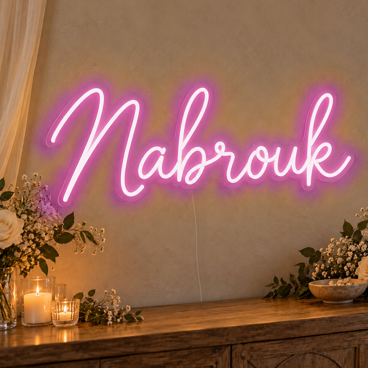 Mabrouk Neon Sign in pink LED neon on clear acrylic, angled view