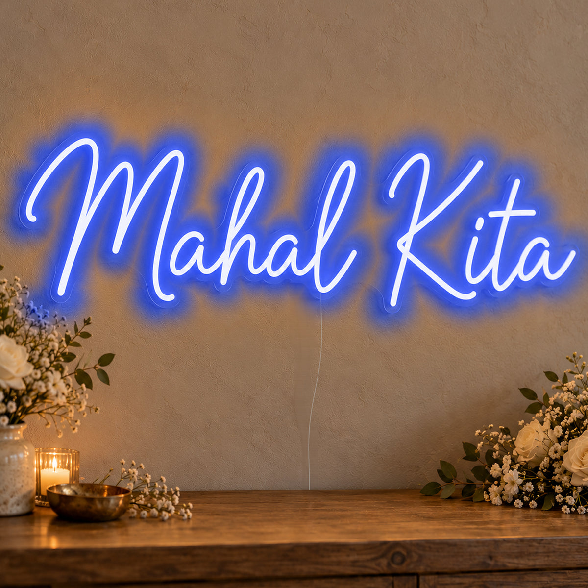Mahal Kita Neon Sign in blue LED neon on clear acrylic, angled view