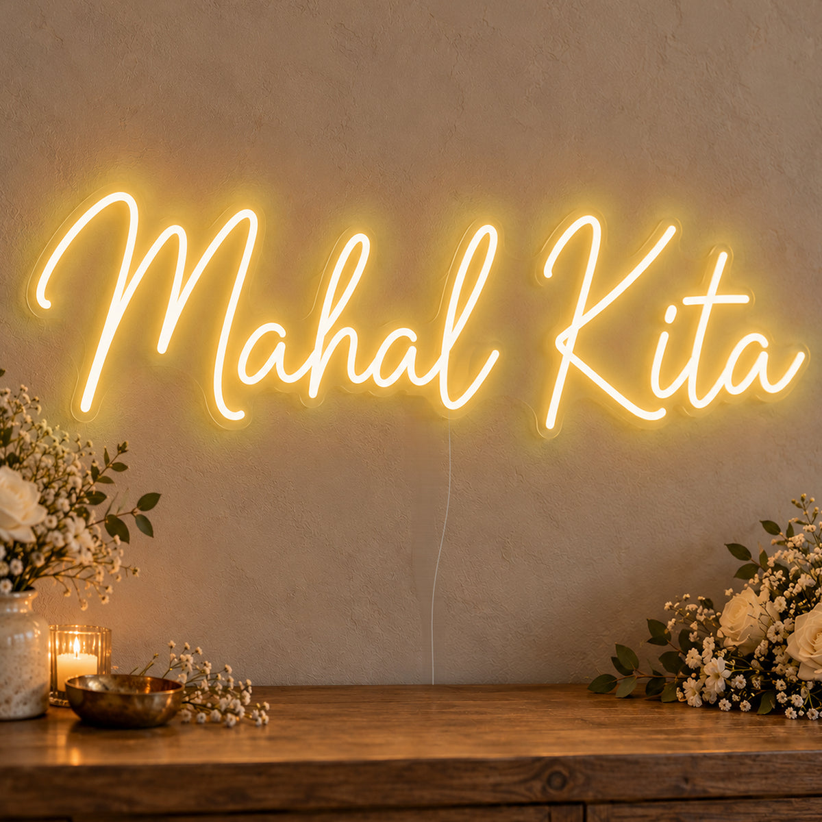 Mahal Kita Neon Sign in gold LED neon on clear acrylic, angled view