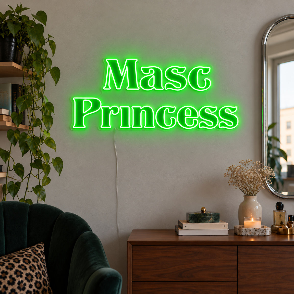 Masc Princess Neon Sign with green lighting, displayed above a wooden sideboard beside a green chair.