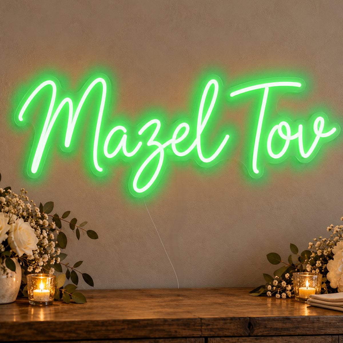 Mazel Tov Neon Sign in green LED neon on clear acrylic, angled view