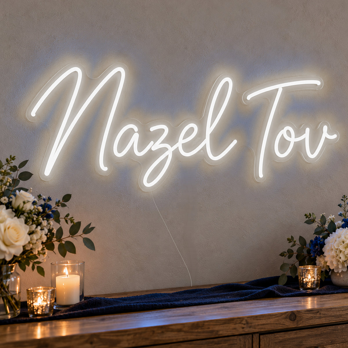 Mazel Tov Blue Neon Sign in white LED neon on clear acrylic, angled view