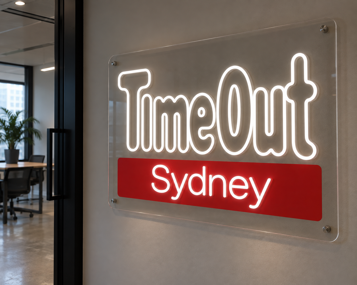 White TimeOut Sydney LED neon sign on clear acrylic, shown as custom sign inspiration for Hornsby.