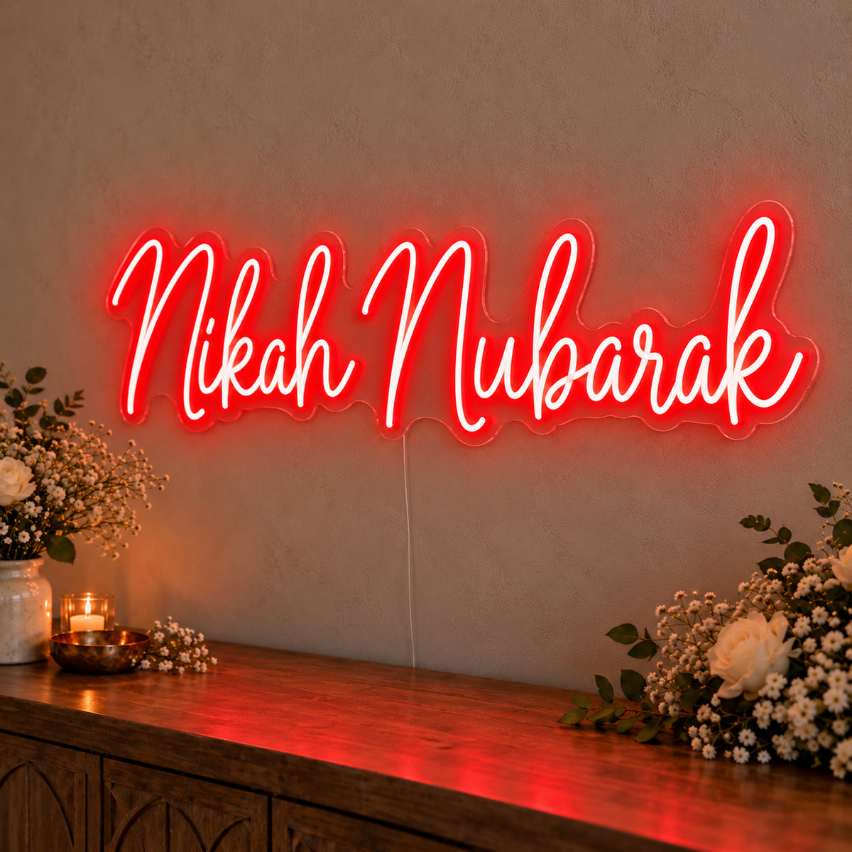 Nikah Mubarak Neon Sign in red LED neon on clear acrylic, angled view