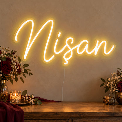 Nişan Neon Sign in gold LED neon on clear acrylic, angled view