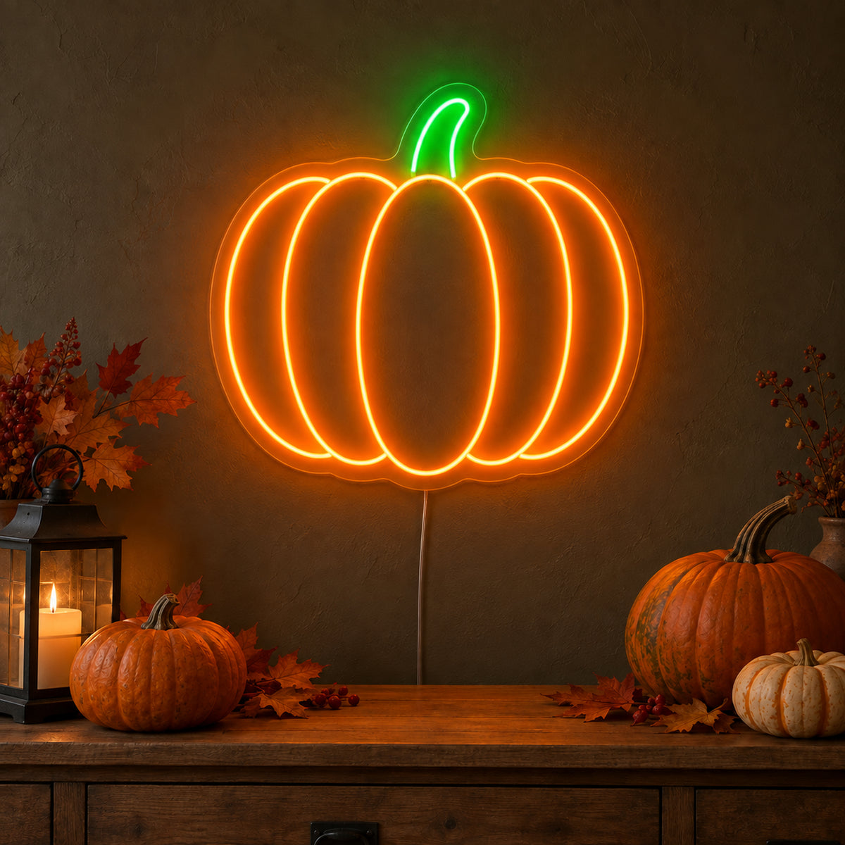 Orange Pumpkin Neon Sign featuring an orange pumpkin outline with curved segments and a green stem, glowing on a dark wall in a Halloween room display.