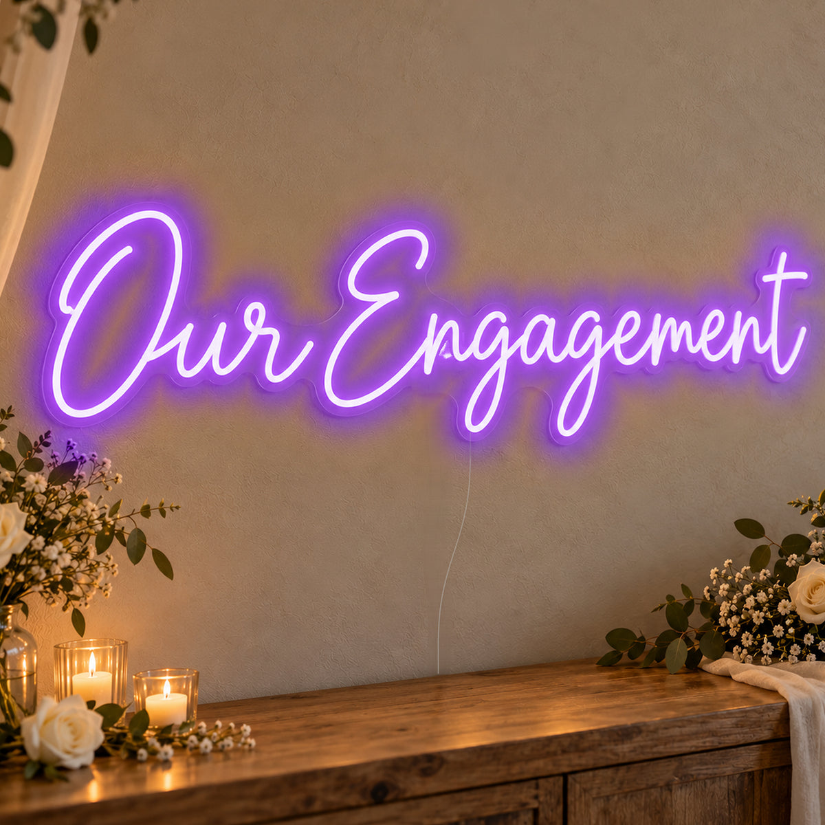 Our Engagement Neon Sign in purple LED neon on clear acrylic, angled view